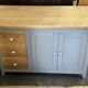 Vintage sideboard painted in gray and raw wood