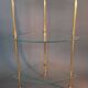 Neoclassical style 3-shelf corner cupboard in gilded brass, Circa 1950/1960.
