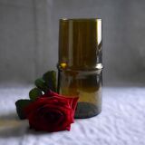 Cylindrical amber glass vase