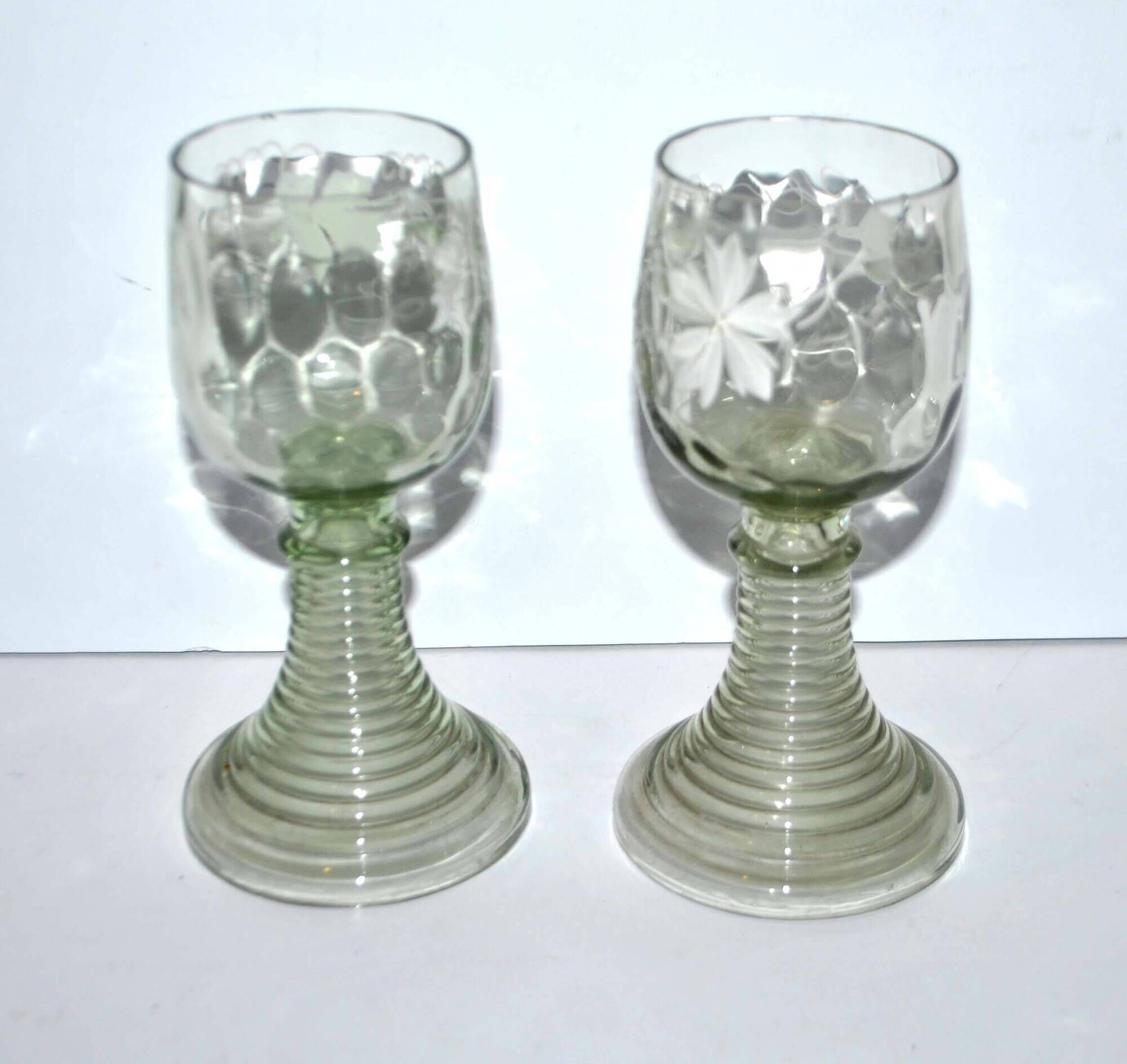 Roemer old rhine wine glass in light green white enamelled blown glass