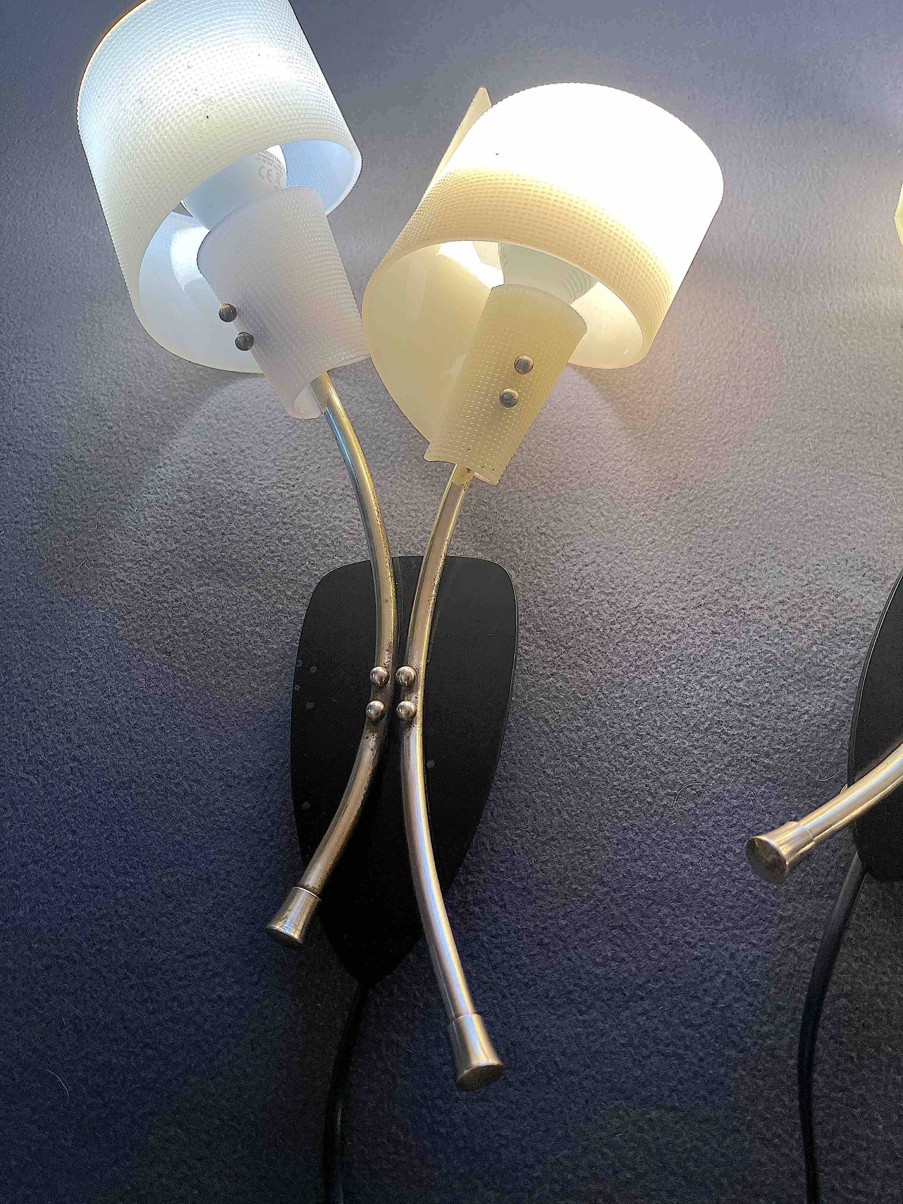 Pair of "vintage" wall lights in brass, perspex, and black bakelite, France Mid-Century