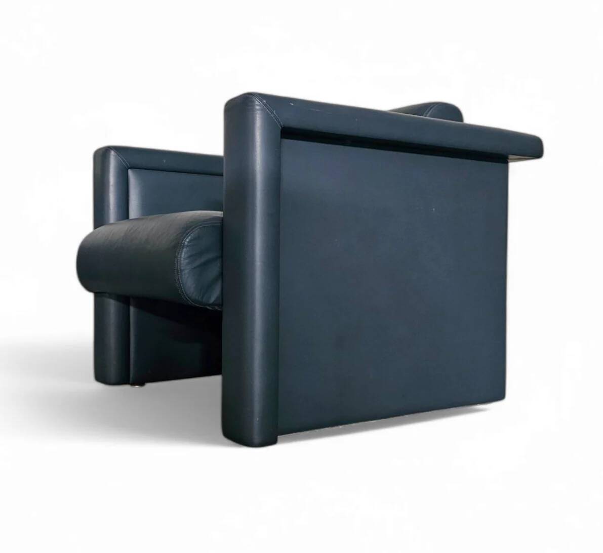 Pair / Trix and Robert Haussmann / Dark grey leather chairs by Knoll
