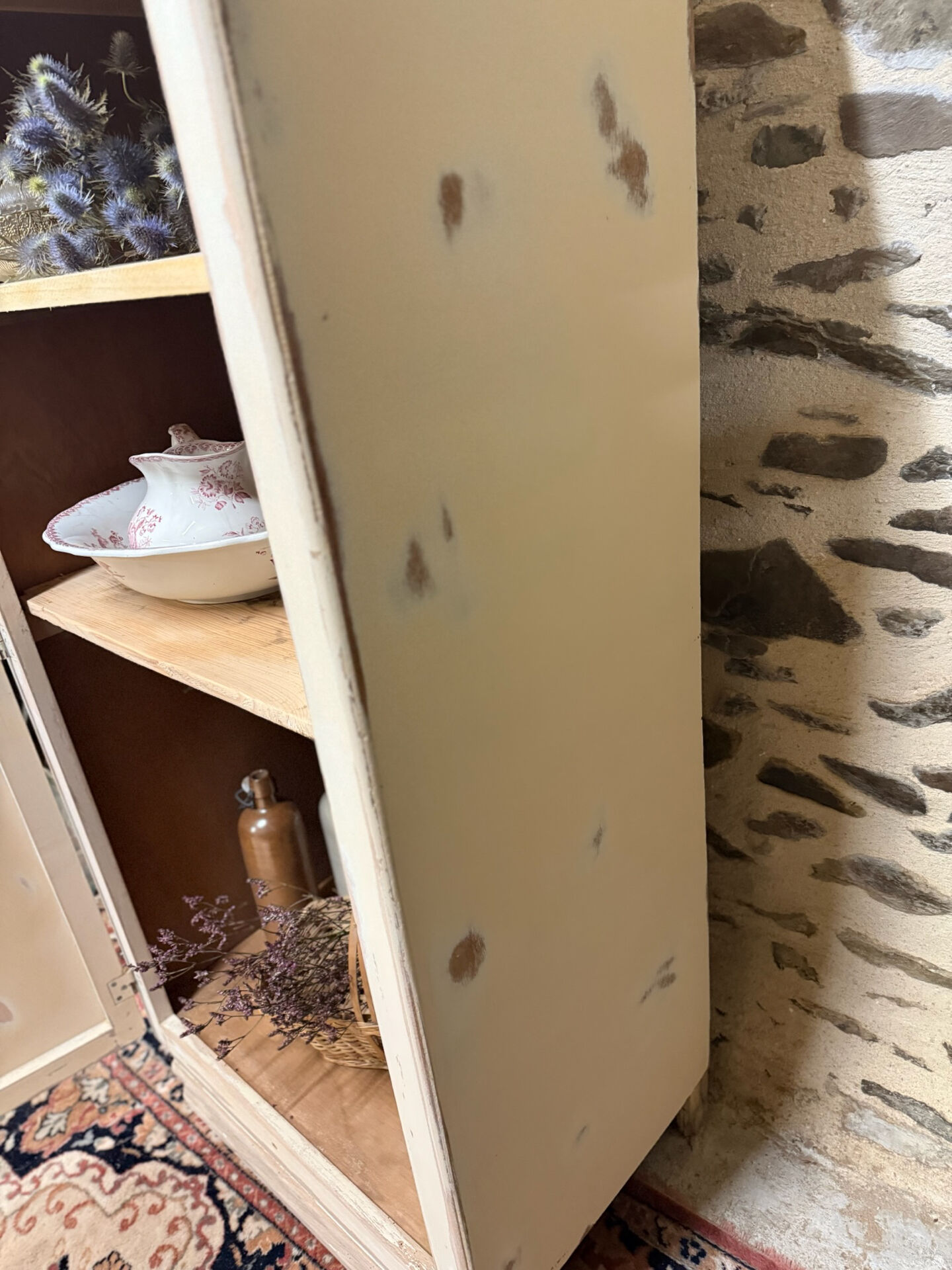 Small one-door Art Deco cabinet with a patina.