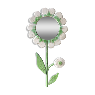 Ceramic flower mirror.