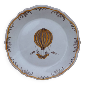 18th century Nevers earthenware plate with hot air balloon pattern