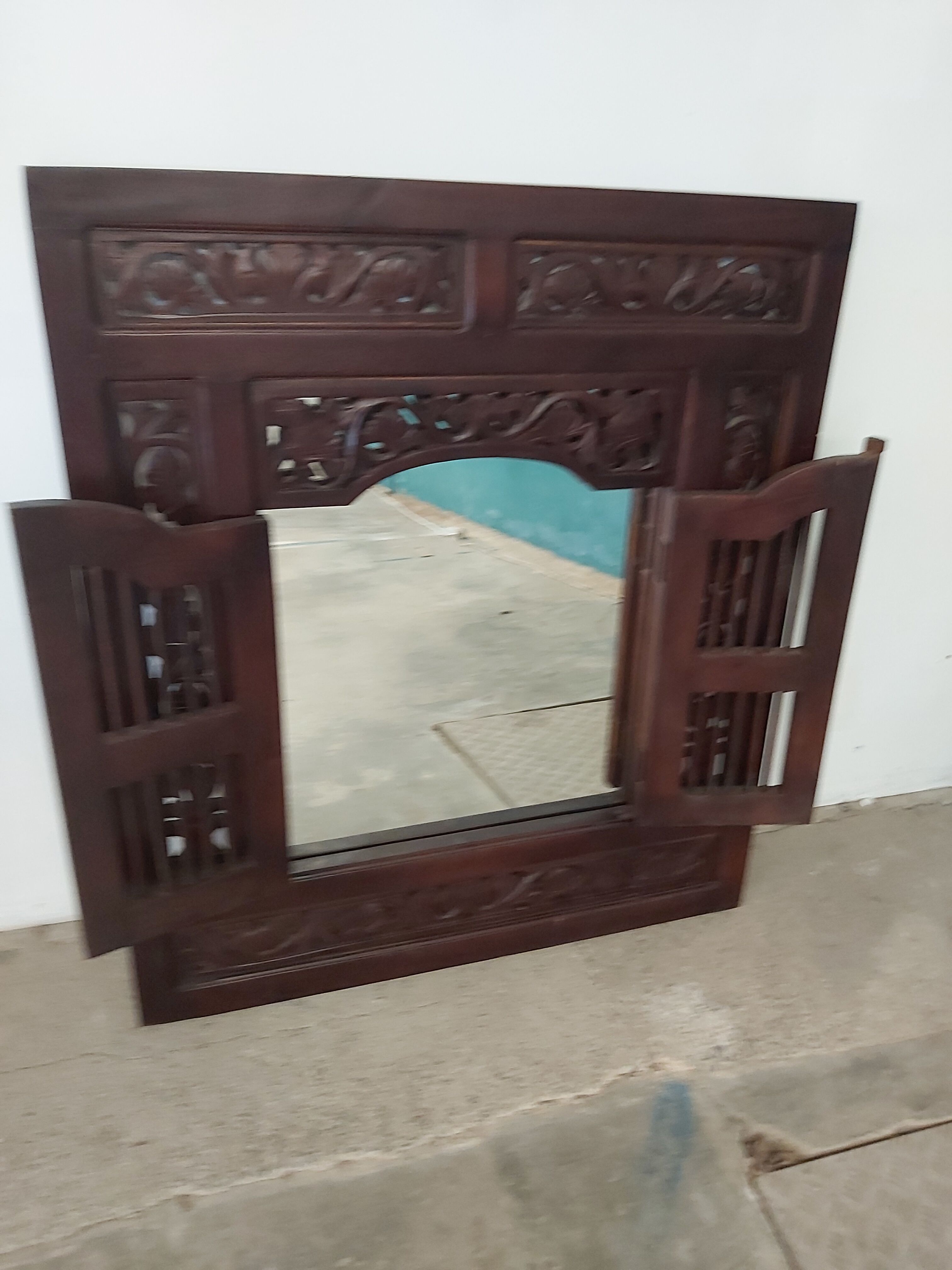 Indonesian window mirror