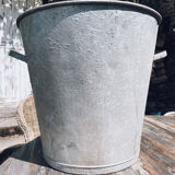 Lessiveuse ancienne en zinc avec son étiquette d’origine et son couvercle.
