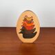 Vintage wooden puzzle with duck figurines.