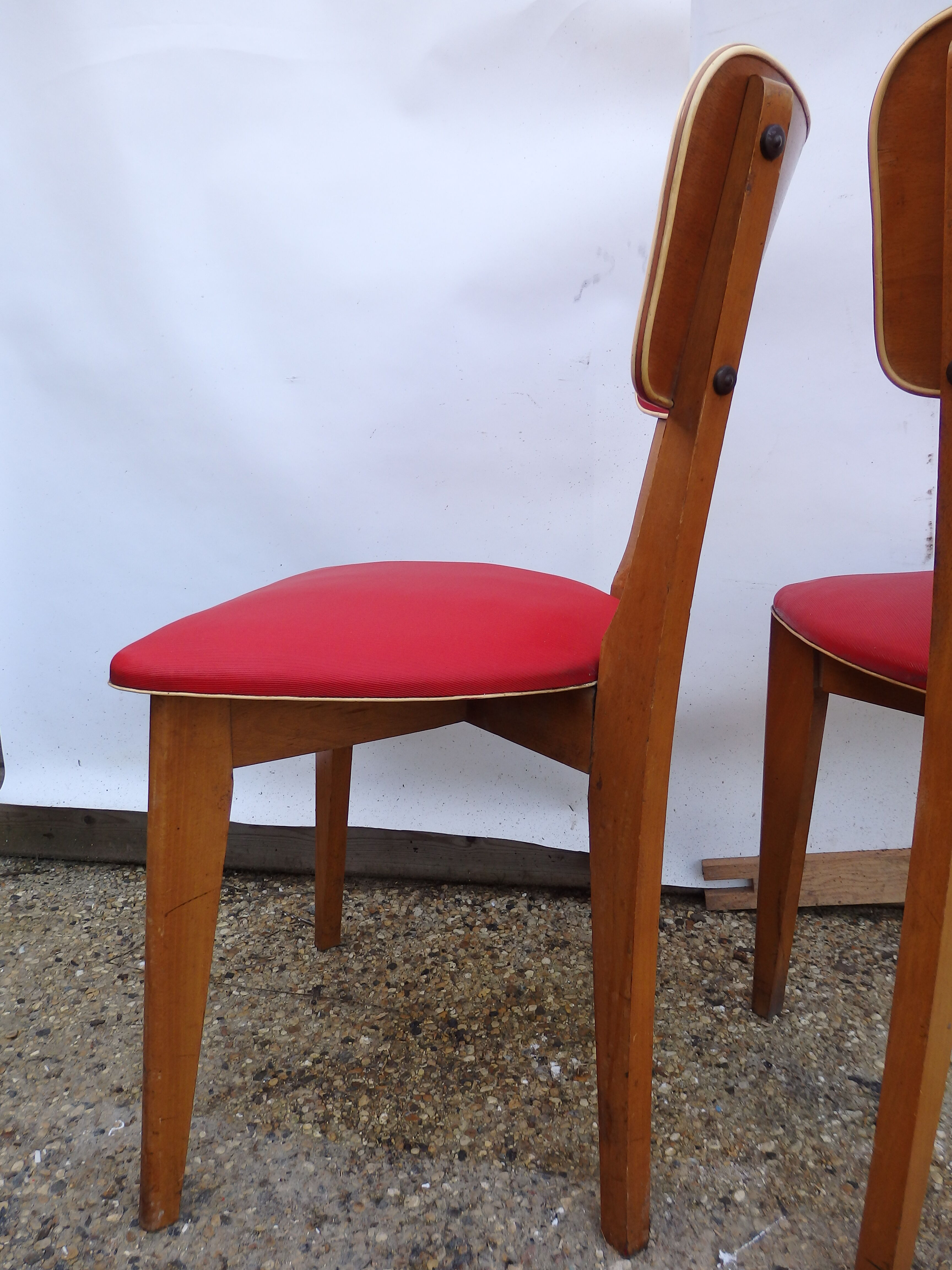 2 vintage red chairs