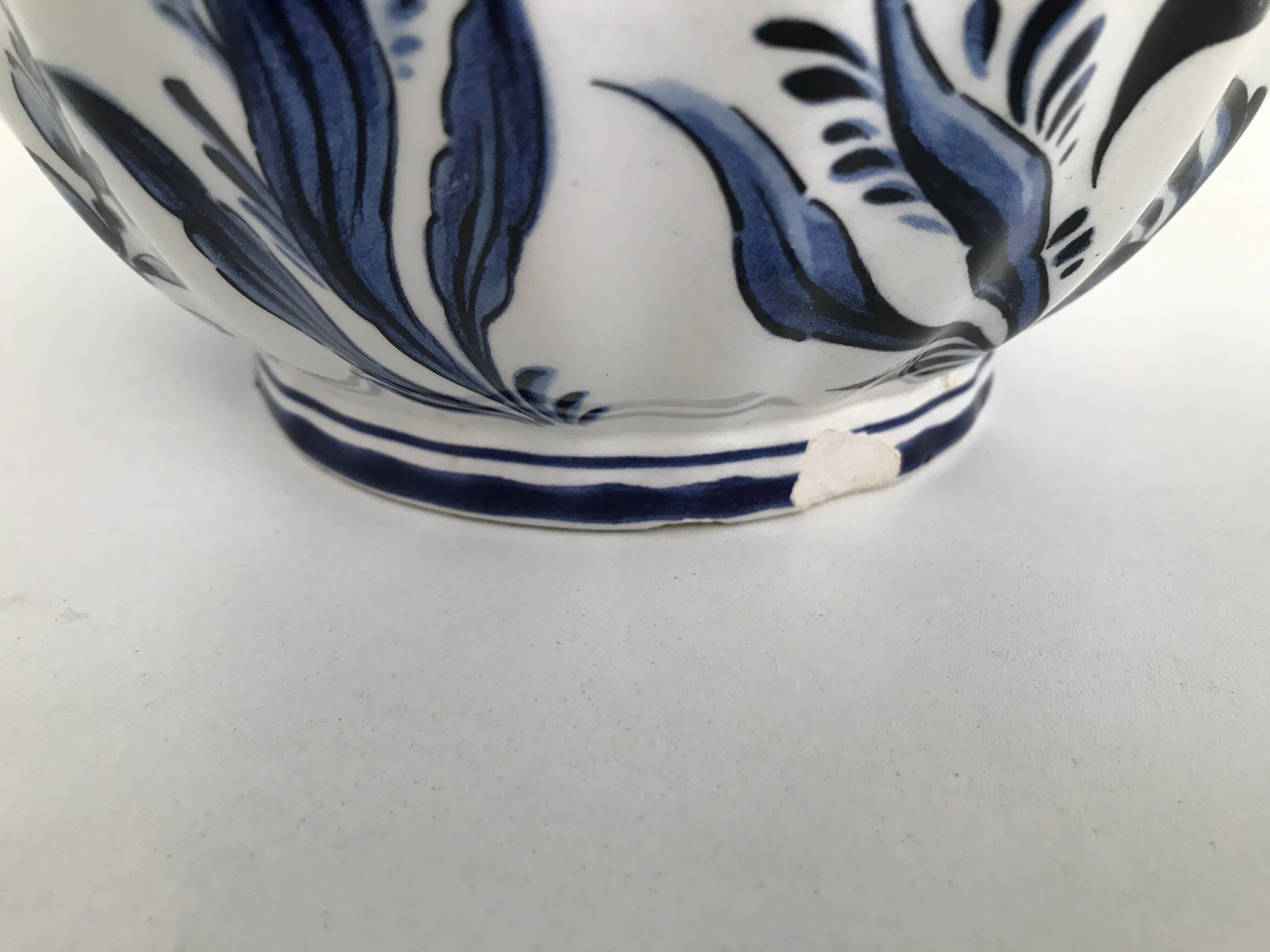 Vase with vintage blue and white flower pattern signed