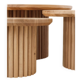 Round tables in solid oak
