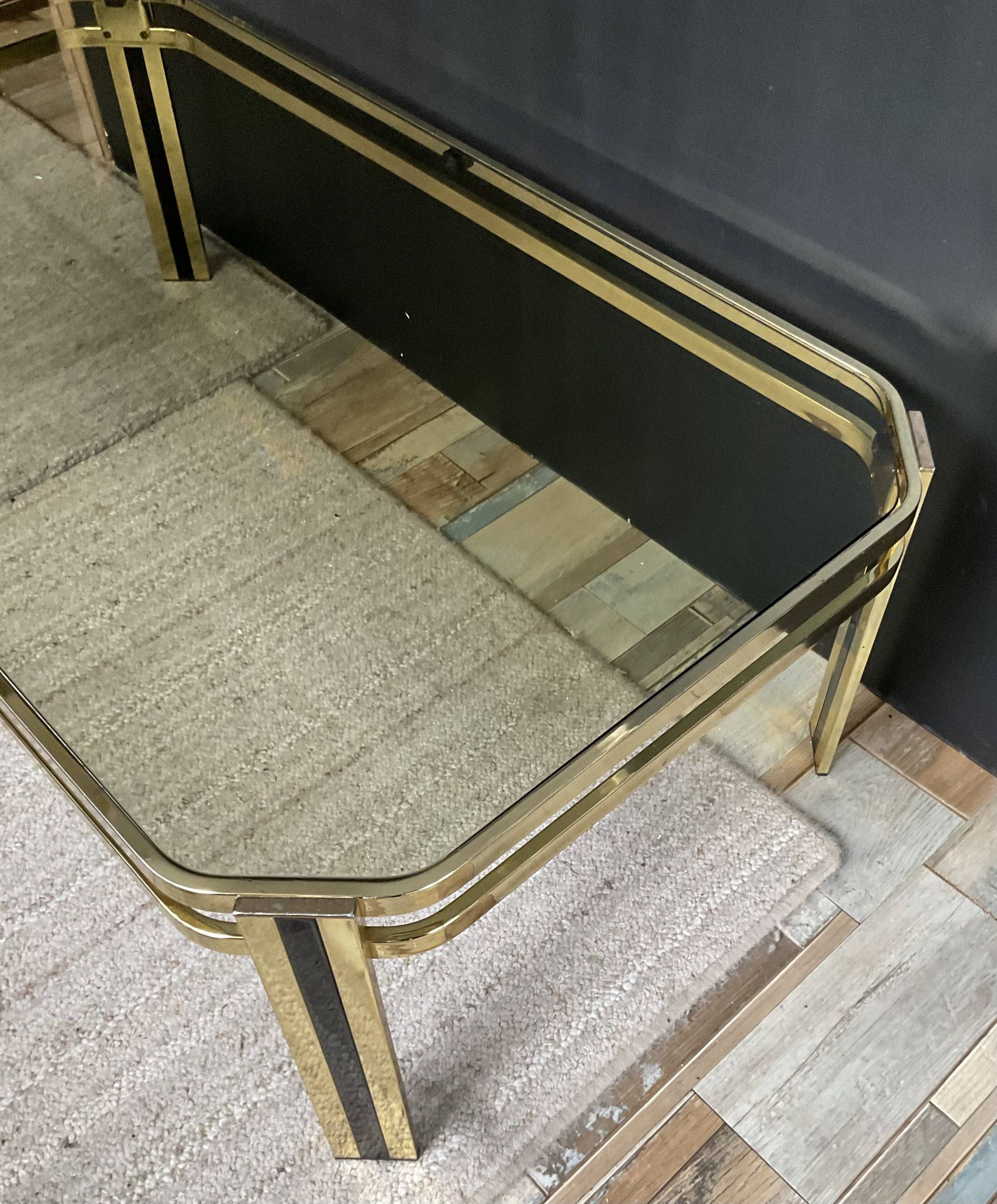 Vintage 1970s coffee table in gold metal and smoked glass.