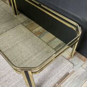 Vintage 1970s coffee table in gold metal and smoked glass.