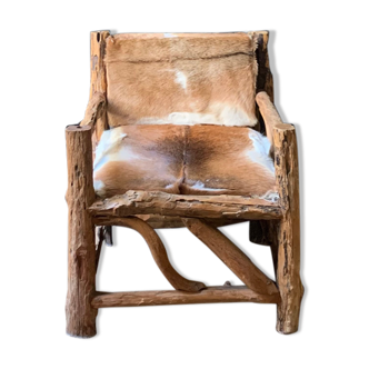 Original armchair raw teak and skin