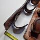 Pair of game bags in saddle leather and brass, old, 3 hooks, 57 cm