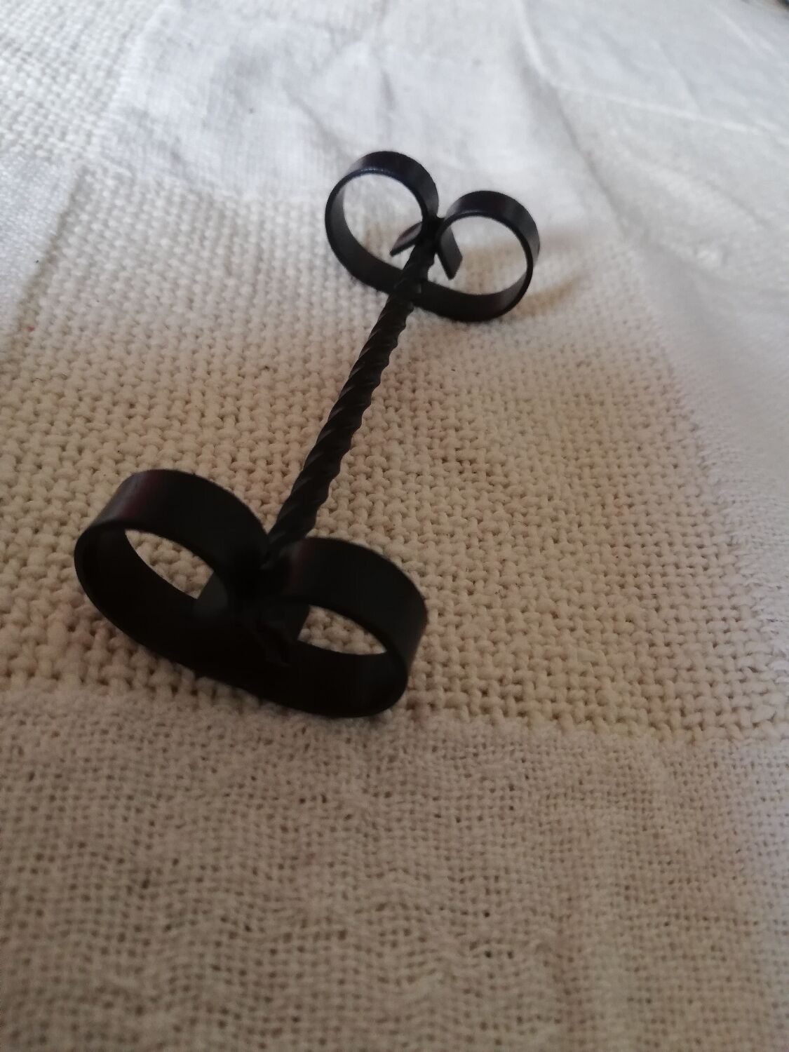 Set of 12 black twisted wrought iron knife holders from the 50s