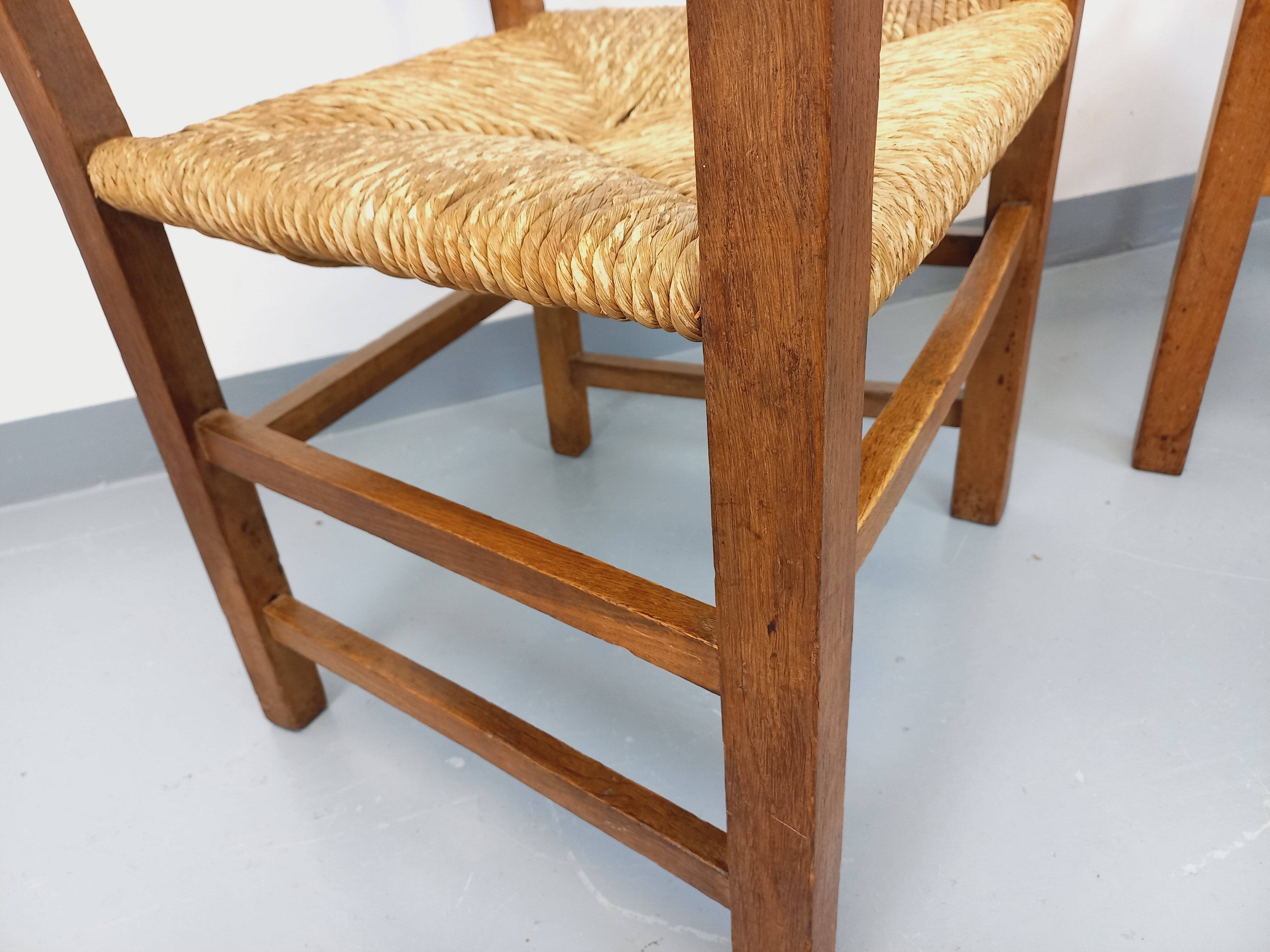 Set of 2 vintage brutalist armchairs in oak wood and straw