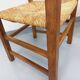 Suite de 2 fauteuils brutalistes vintage en bois de chêne et paille