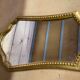 Miroir doré de style Louis XV 30x55cm