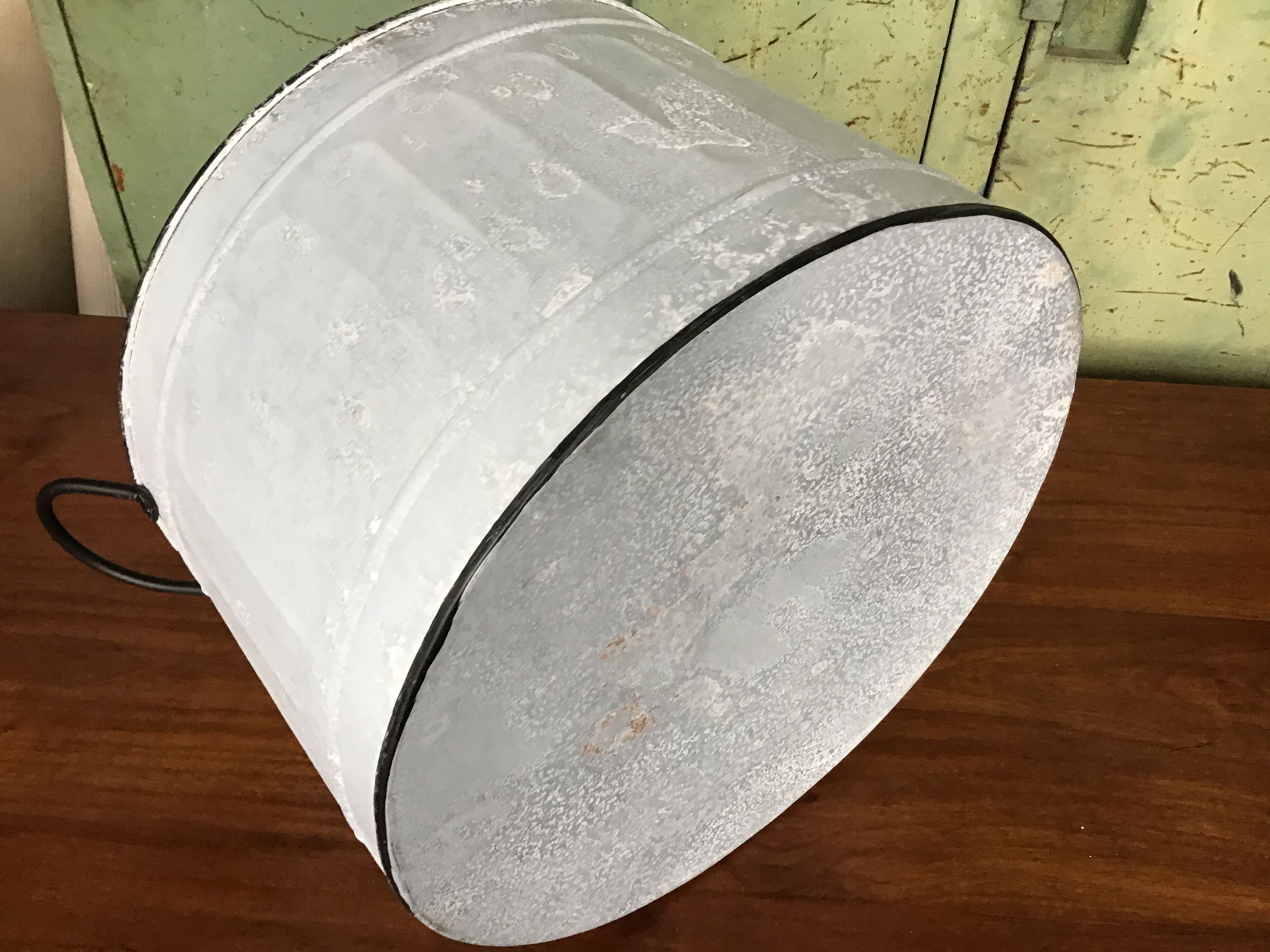 large round basin in vintage zinc