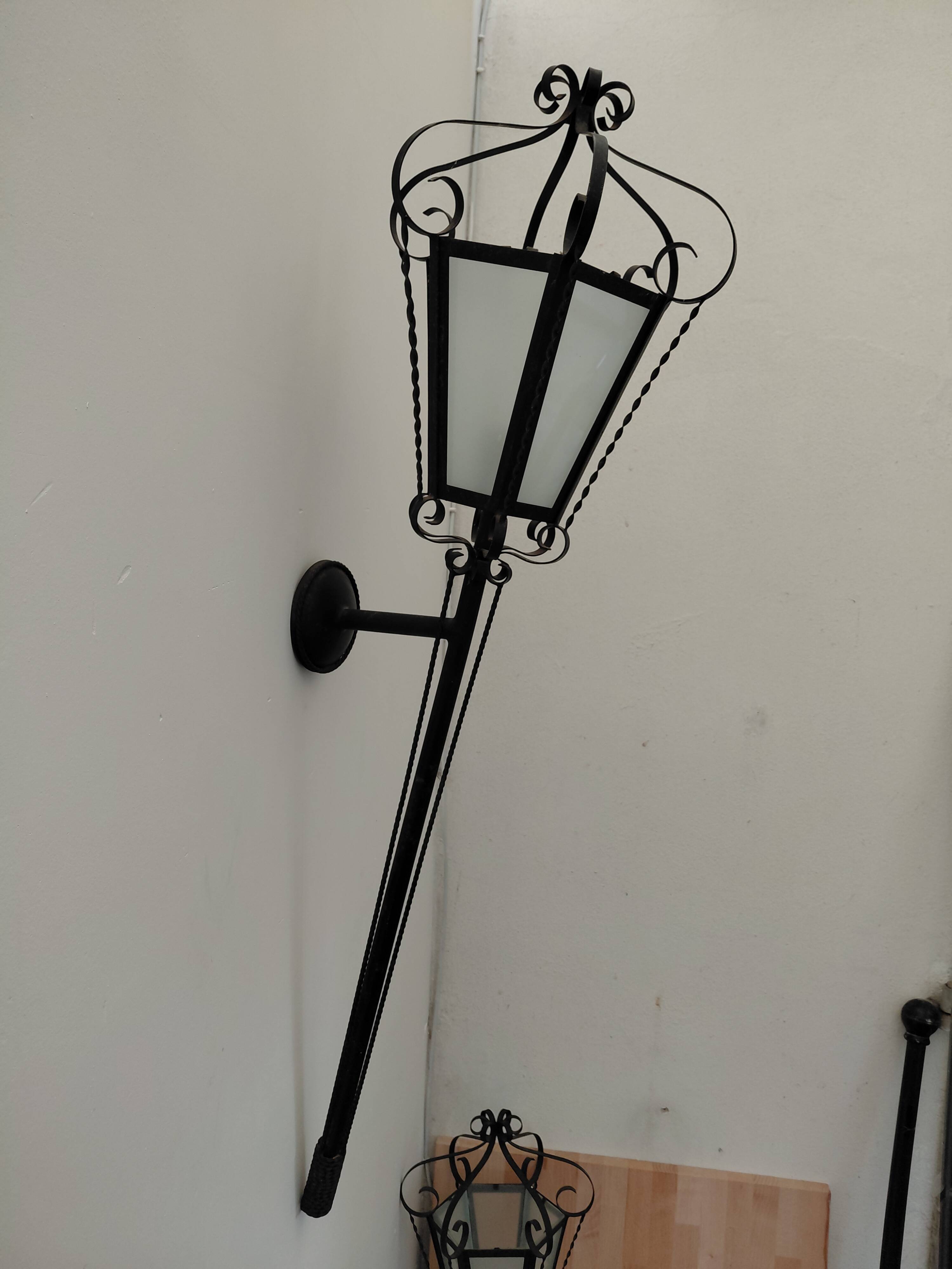 Pair of wrought iron wall sconces, 1950