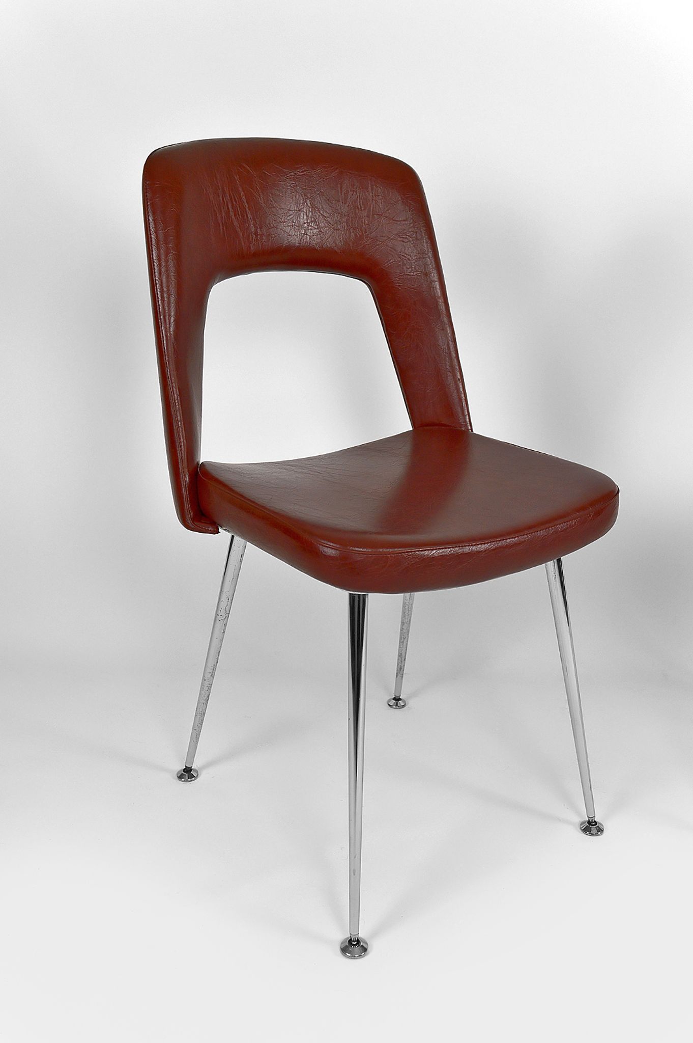 Pair of chairs in chrome and skaï, circa 1960