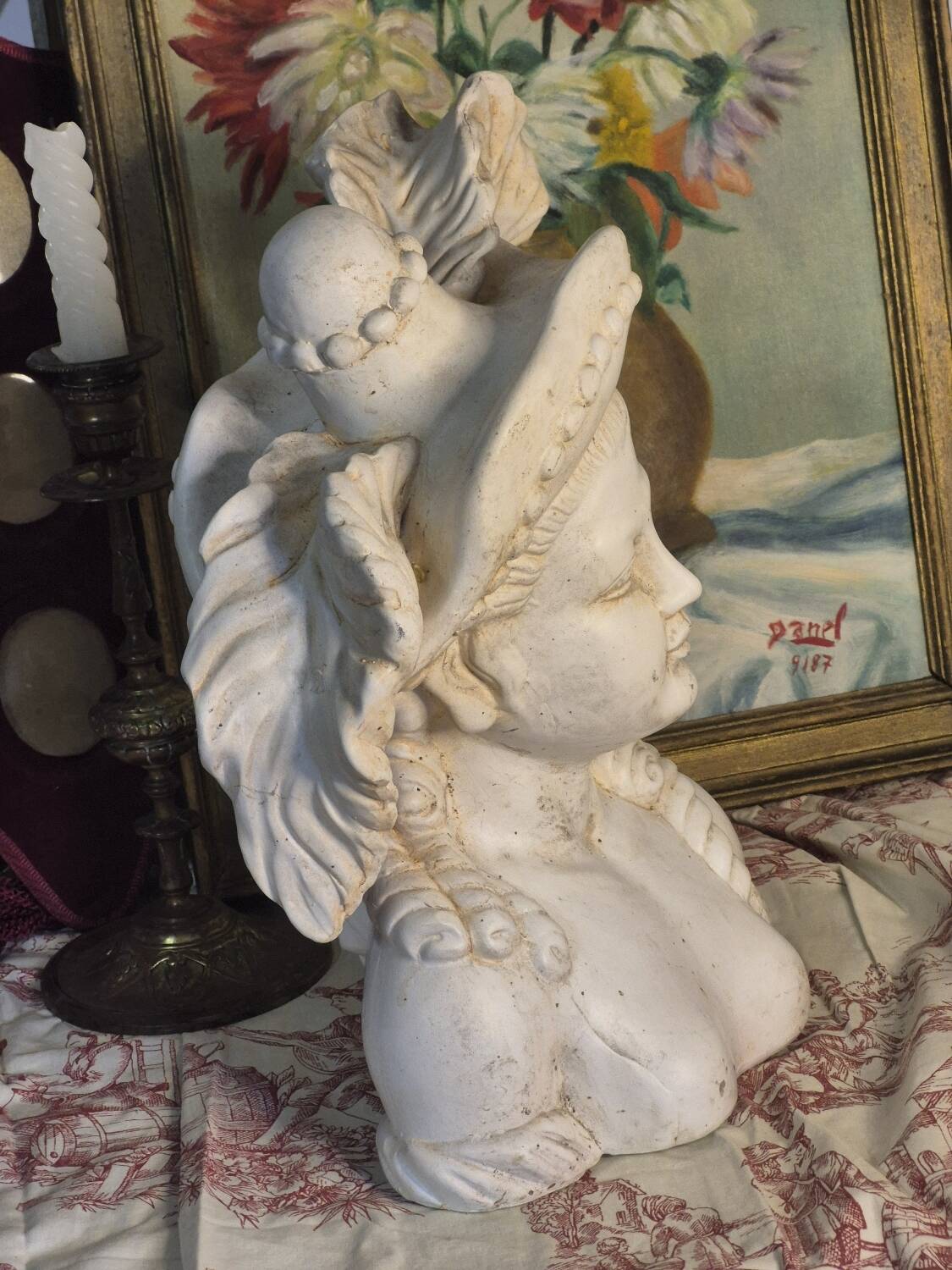 Bust of a woman with a hat