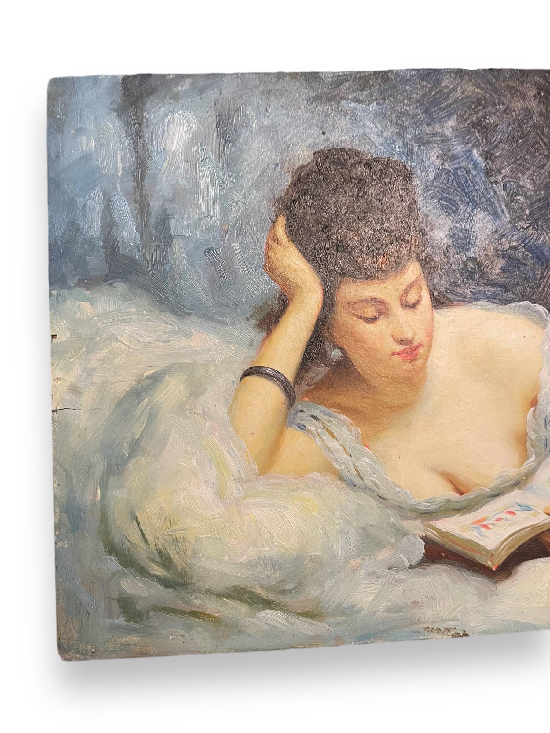 Young woman lying reading oil on panel