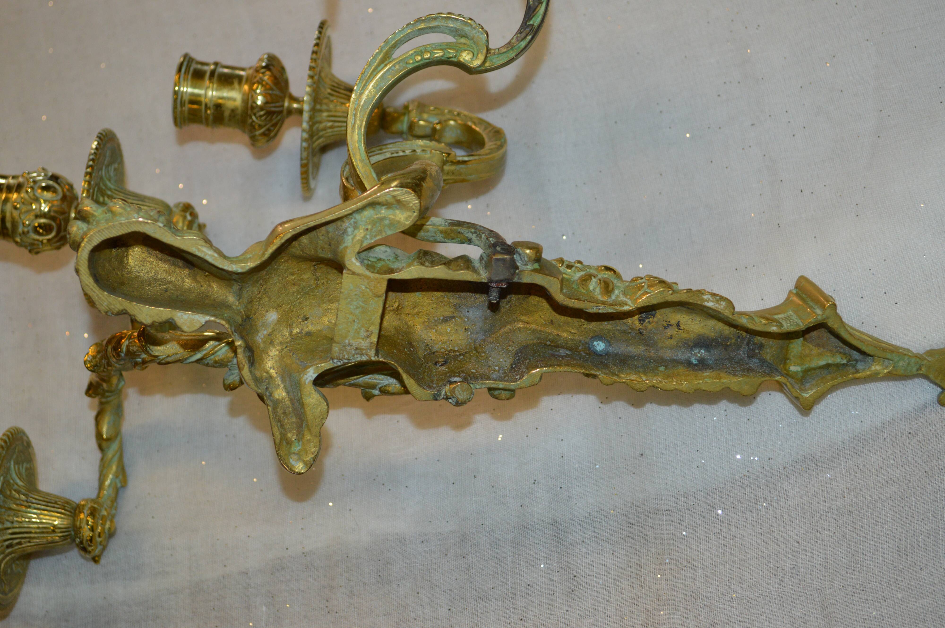 Louis XV style bronze sconces with cariatids