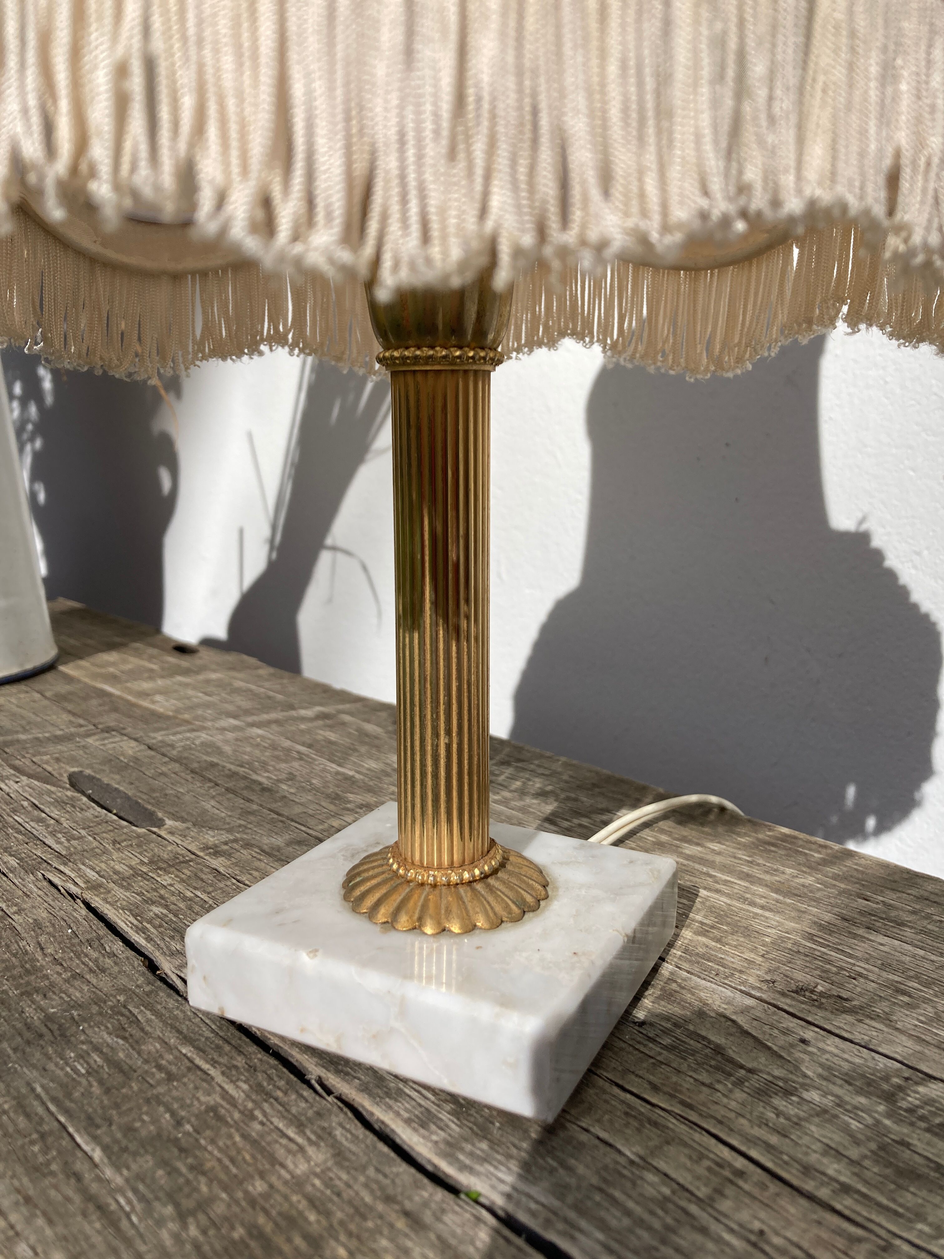 Marble table lamp and antique golden column