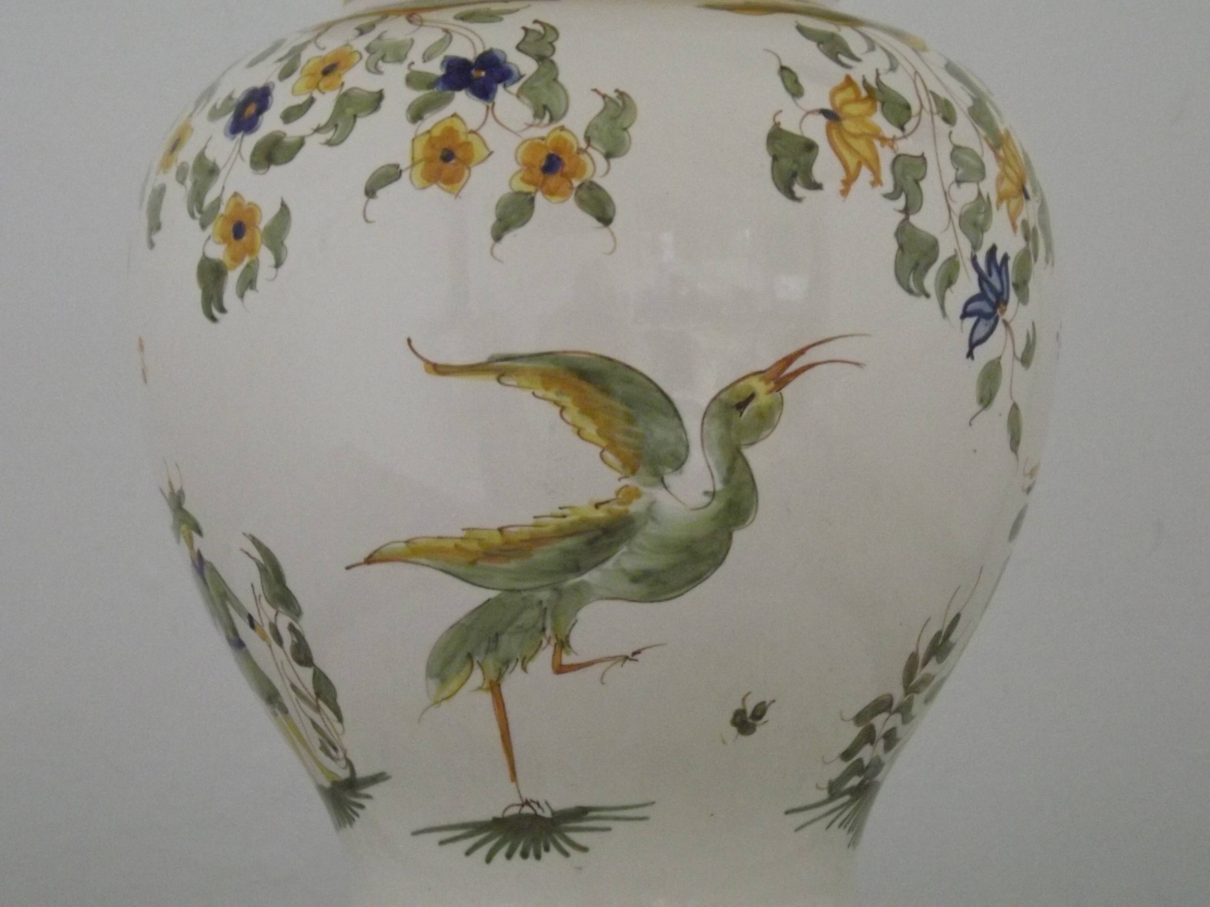 Table lamp with wooden base and fringed shade