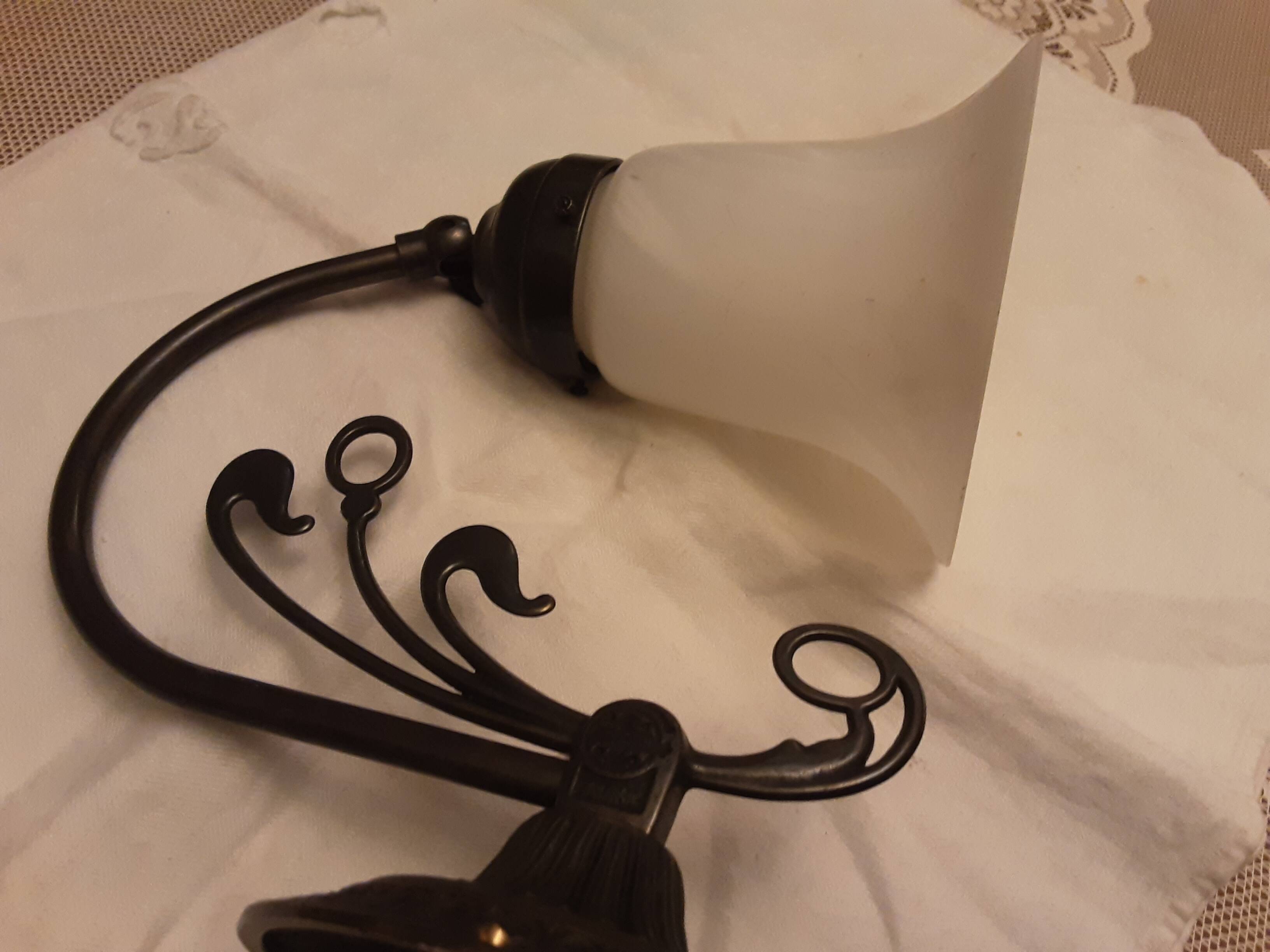 Glass wall light with iron frame
