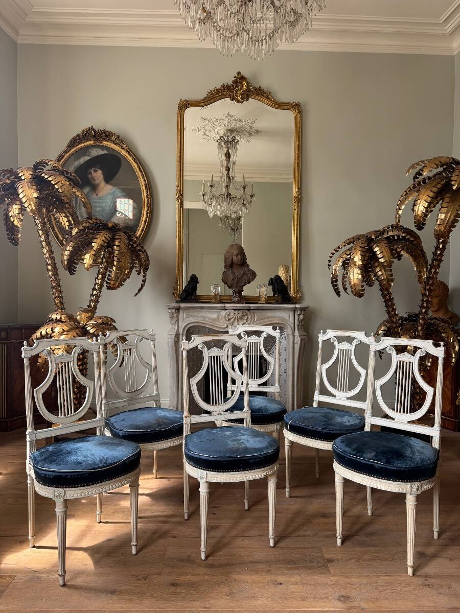 Set of 6 lyre chairs from the Napoleonic III period in painted wood in the Louis XVI style.
