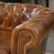 Brown leather Chesterfield sofa
