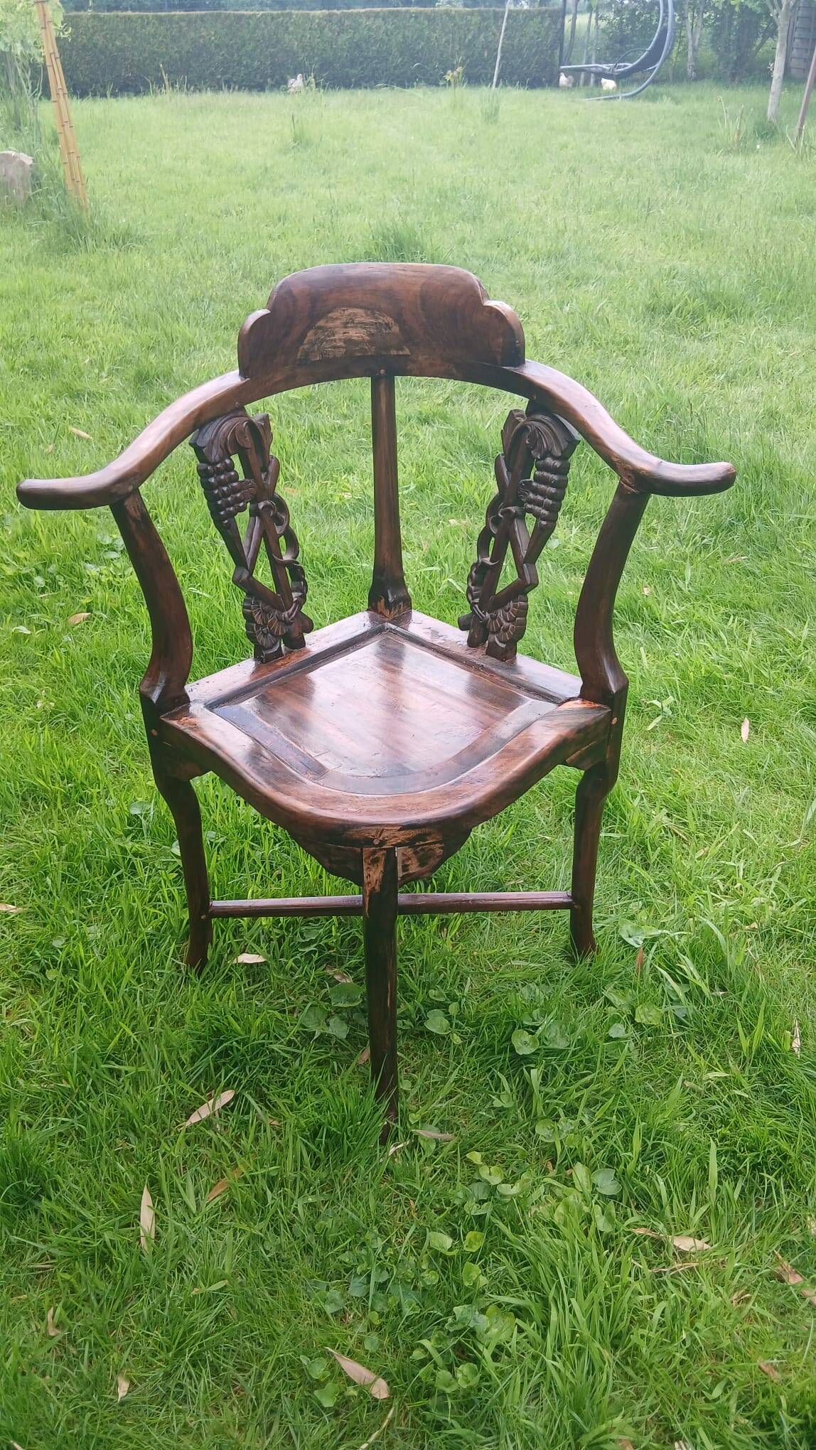 Set of 6 corner chairs in colonial style made of carved exotic wood from Bali.