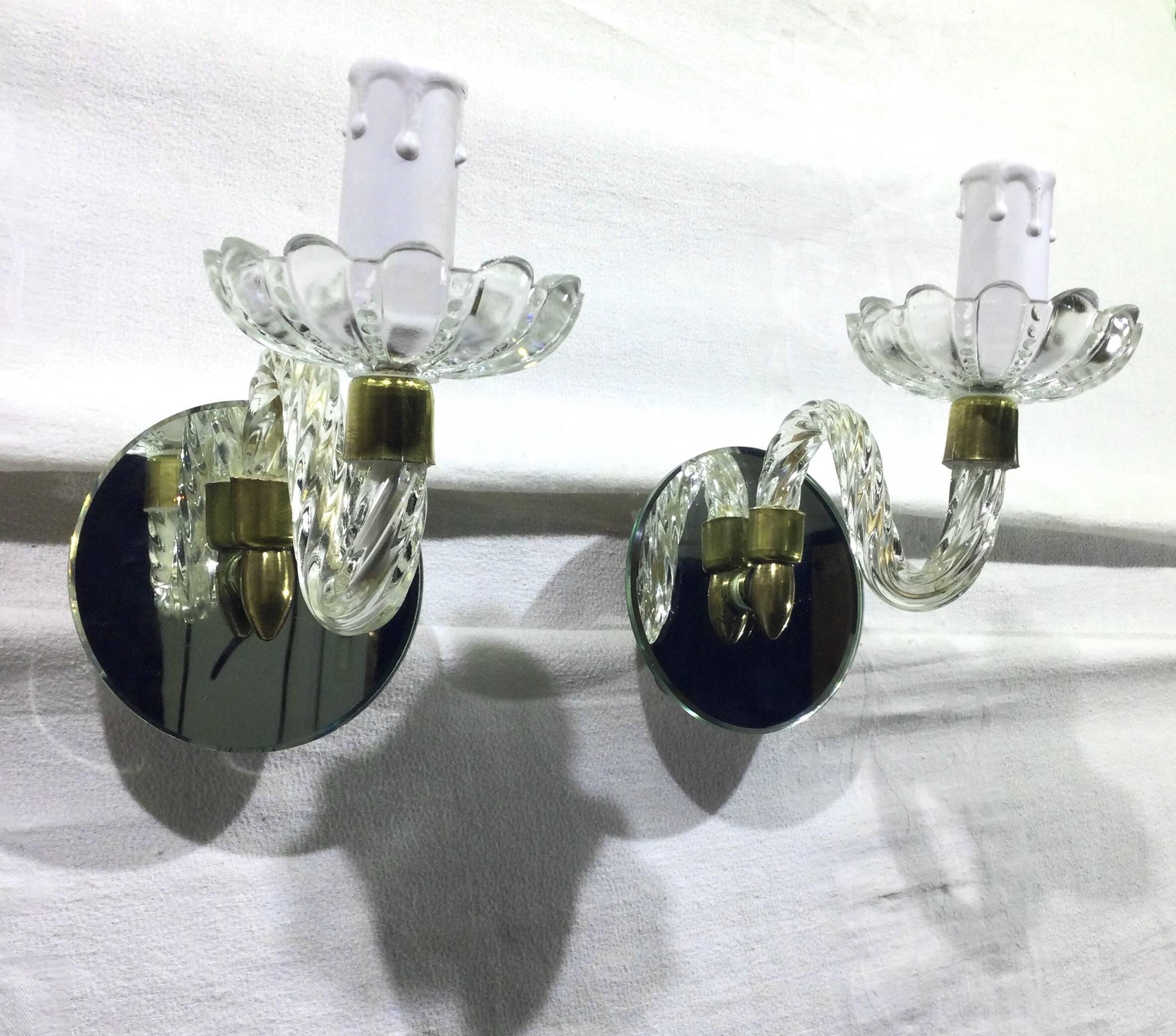 Pair of glass and mirror sconces