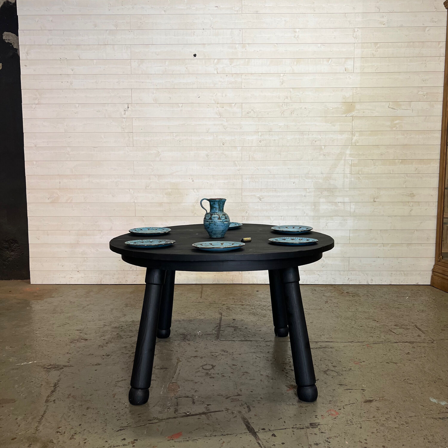 Brutalist round table in burnt wood yakisugi