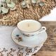 Natural soy wax candle and porcelain cup