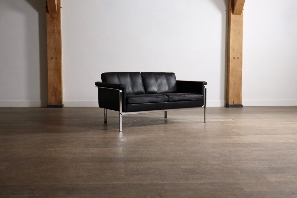 Horst Brüning Model 6912 two seater sofa in black leather for Kill International, Germany 1967