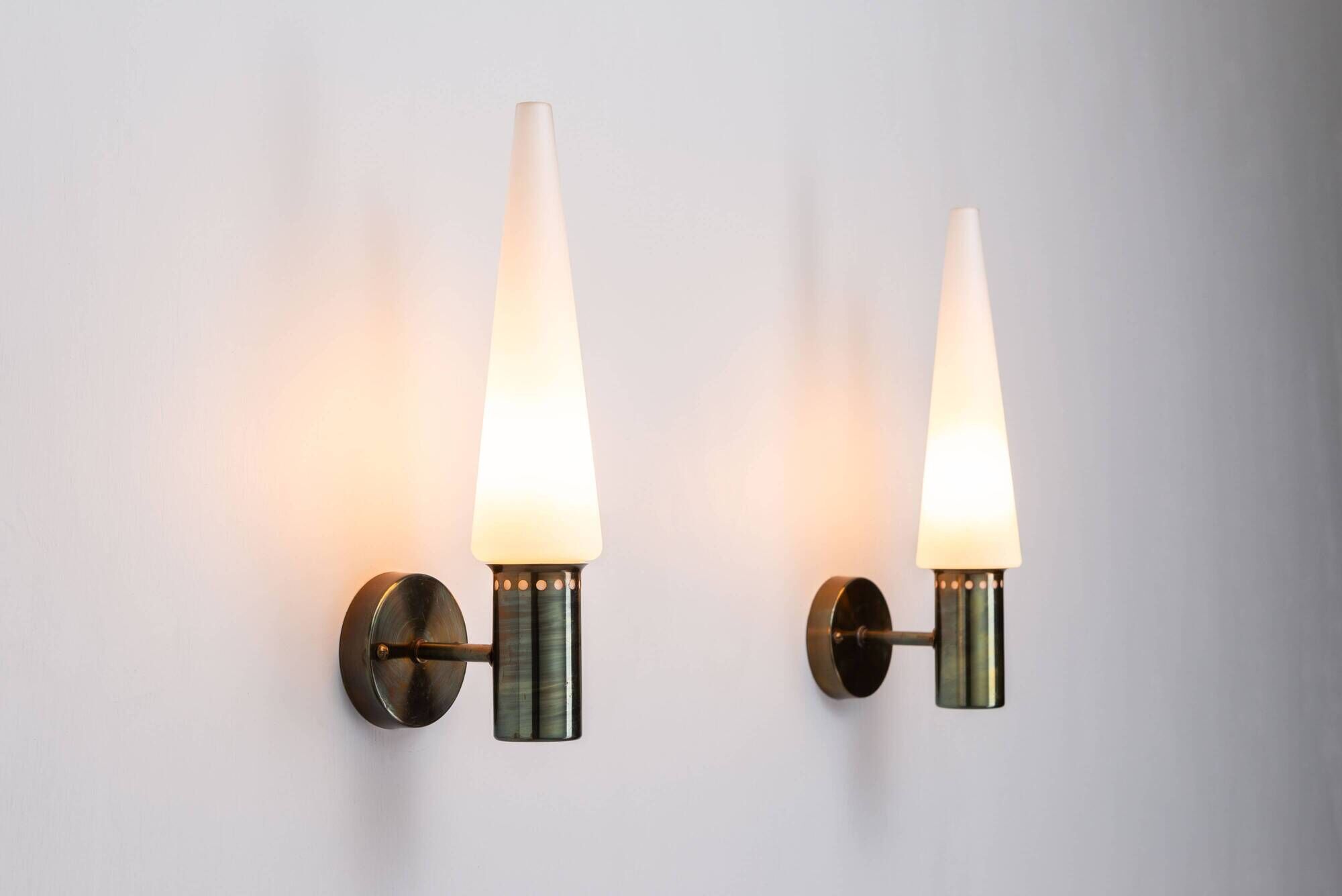 Set of two Hans Agne Jakobsson wall lamps with opal glass shades