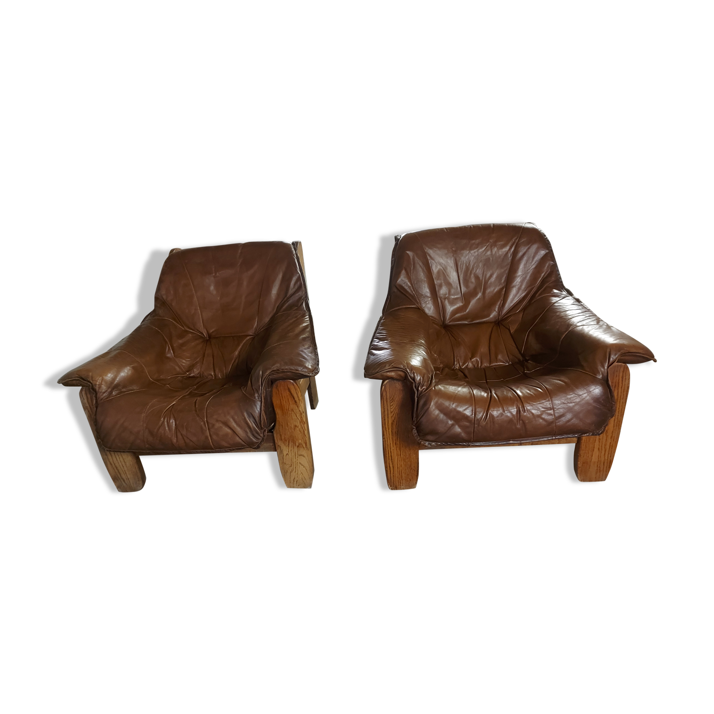 Armchairs in leather and vintage wood 70's