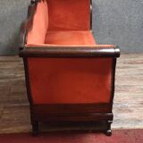 Sleeper or bench from the Charles X period in richly carved mahogany.