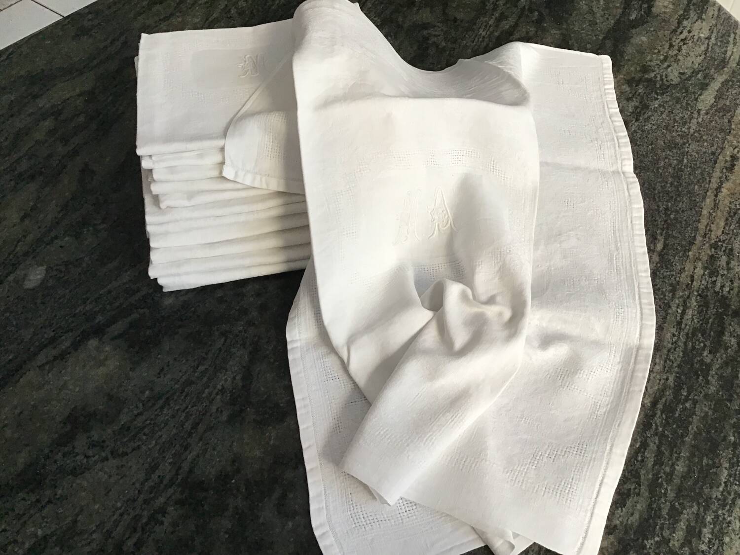 Damask napkins embroidered with an MA monogram