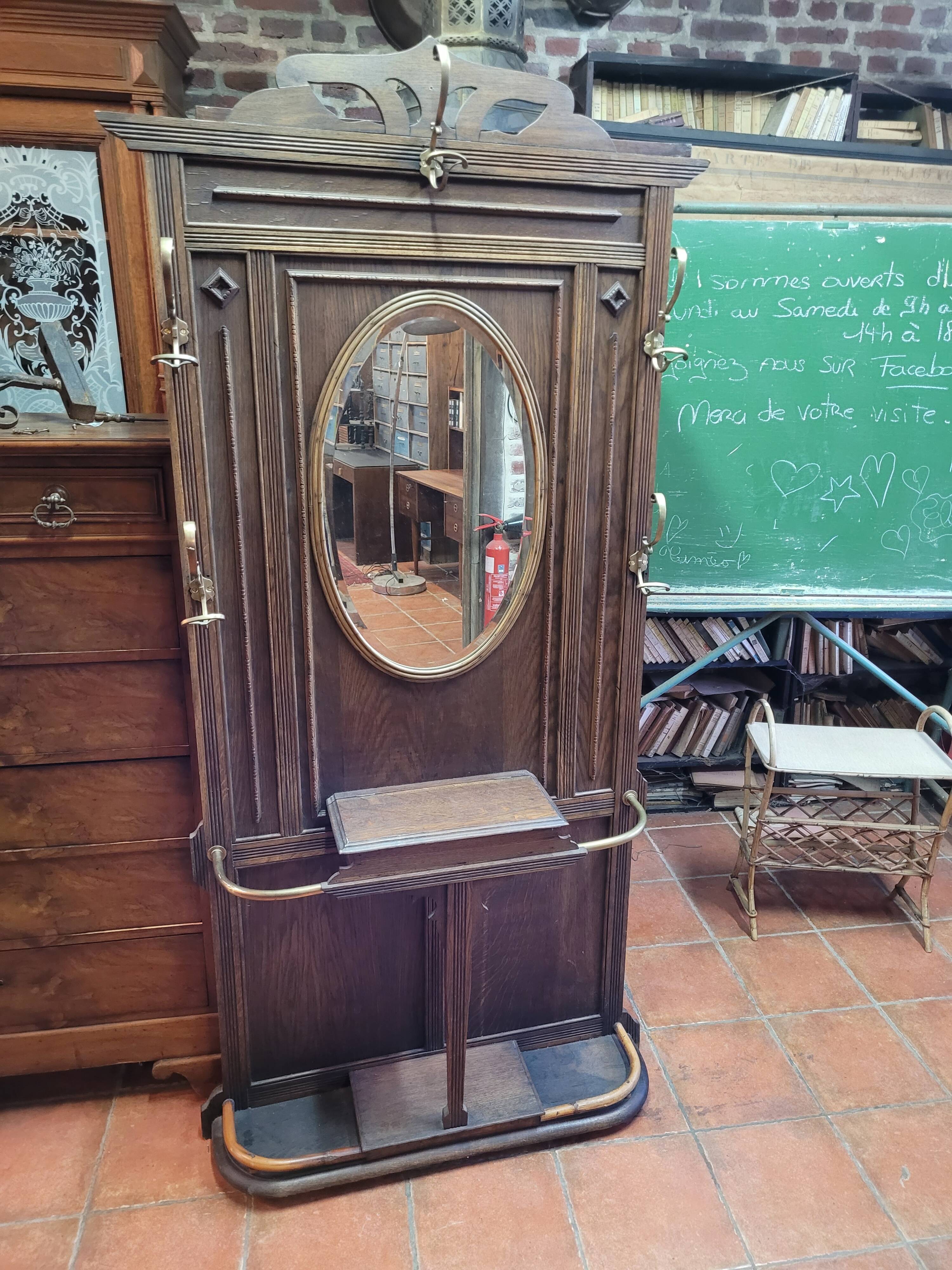 Old cloakroom or coat rack in oak