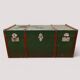 Vintage wooden and metal green travel trunk, circa 1930.