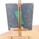 Table mirror on a brass easel