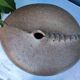 Vintage sandstone vase, in the shape of a rugby ball, signed