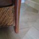 Woven rattan armchair and exotic wood in colonial style, 1980s.