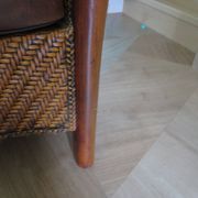 Woven rattan armchair and exotic wood in colonial style, 1980s.