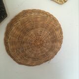 Wall composition of 9 wicker baskets and trays.